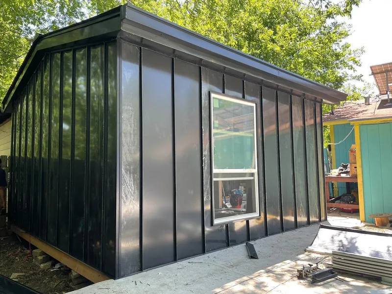 Black standing seam metal wall panels for Metal Roof Installation in Wonder Lake