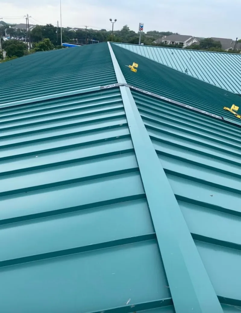 Green commercial metal roof ridge and valley for Metal Roof Repair in Wonder Lake